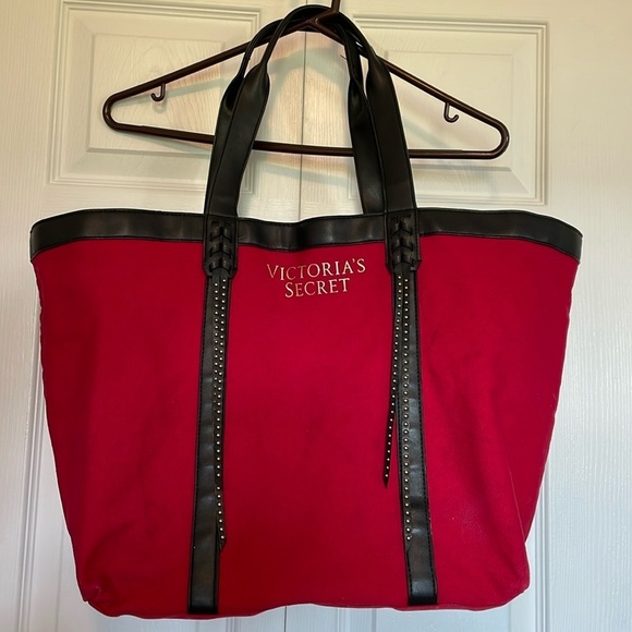 Victoria's Secret Handbags - Victoria Secret red canvas tote with faux leather trim/ straps. Stud detail Moto